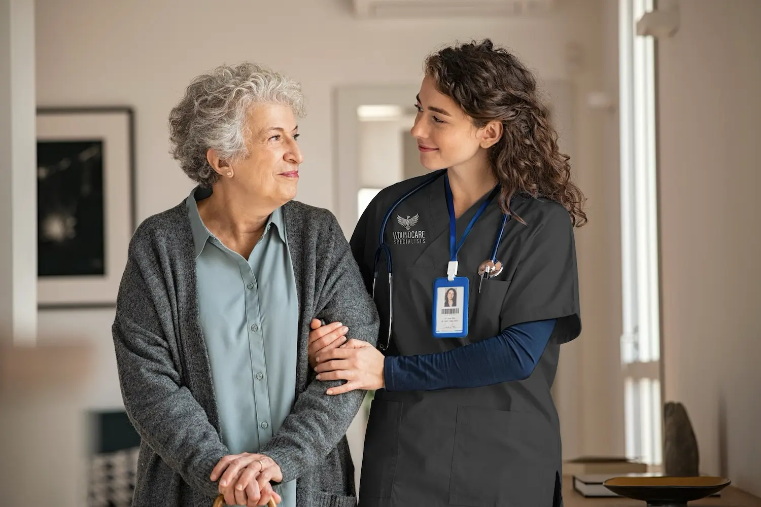 Wound care specialist treating a chronic wound on a skilled nursing resident