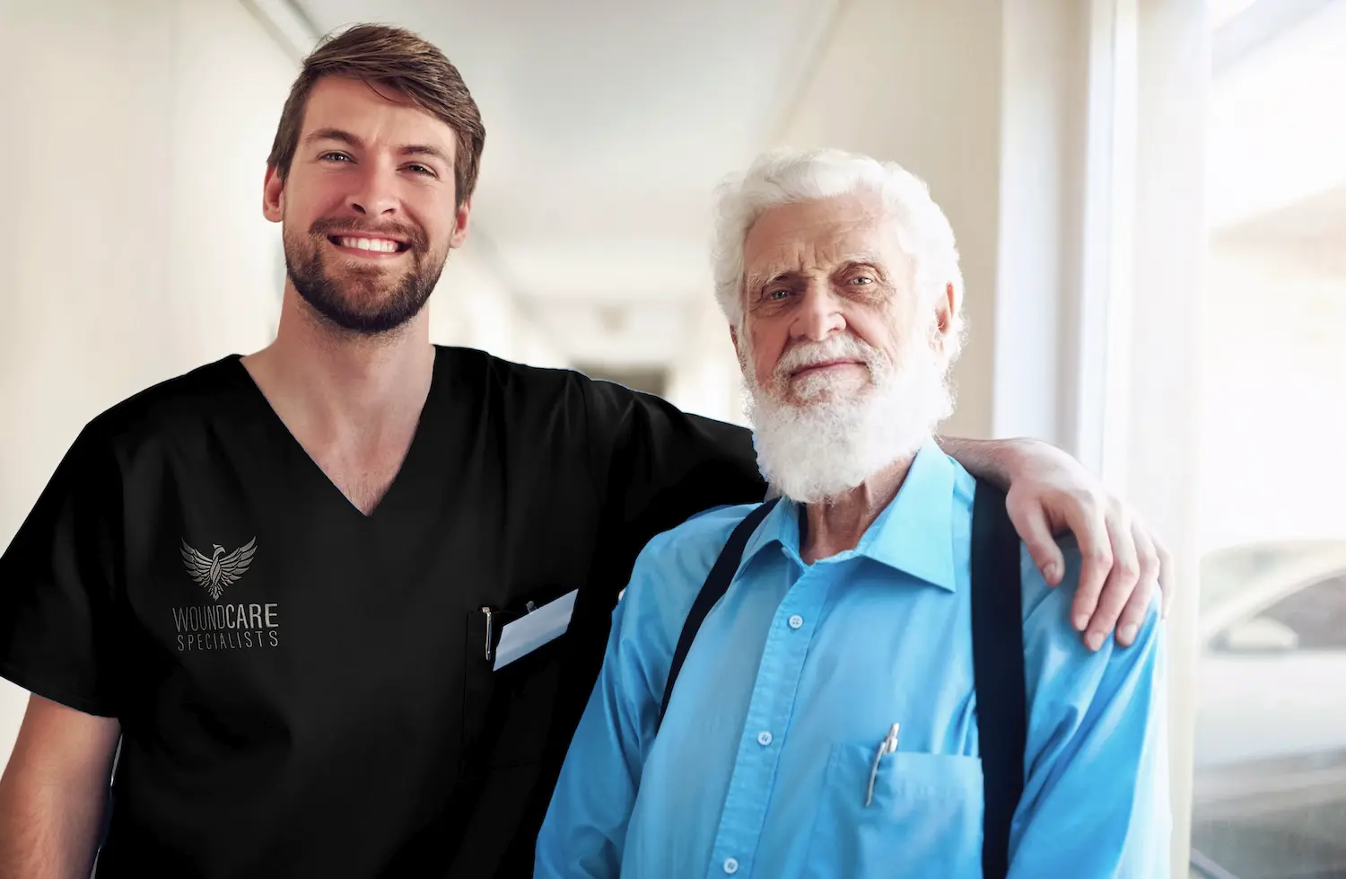 A Wound Care Specialists provider poses with a healed patient